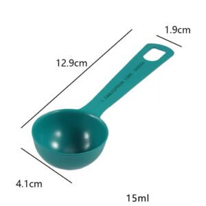 ZEST 15ml stainless steel measuring tablespoon in dark green with dimension markings on a white background